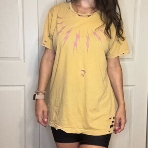 Trendy yellow and pink destroyed oversized tee with lightning bolts